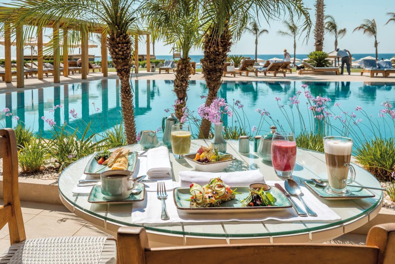 미트시스 알릴라 리조트 앤 스파 팔리라키 외부 사진 Poolside dining at the Four Seasons Hotel, Tel Aviv